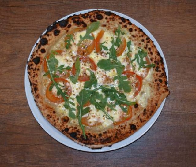 Caprese (Tomato, Mozzarella and Basil Pizza).